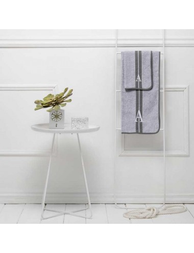 A pair of light gray terry cloth towels with double line
