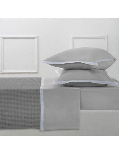 A sand percale set of sheets with percale edge