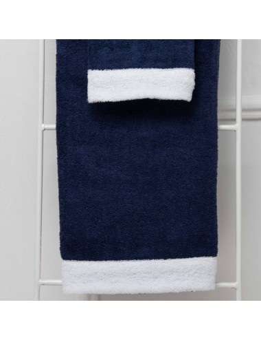 A pair of terry cloth towels with terry cloth edge