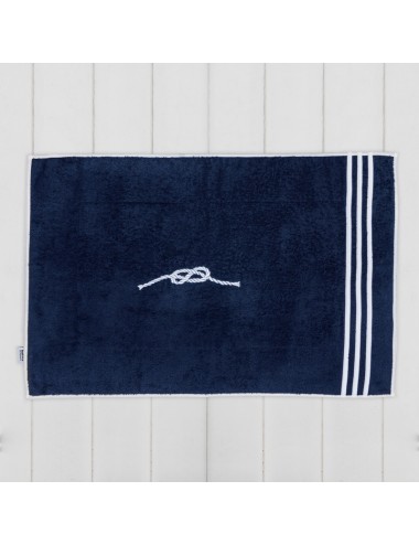 Terry cloth bath mat with nautical knot embroidery