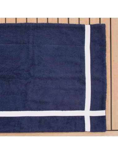 Terry cloth bath mat with gros grain crossings