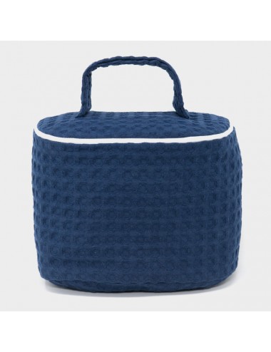 Customizable oval beauty case in blue waffle weave