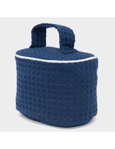 Customizable oval beauty case in blue waffle weave